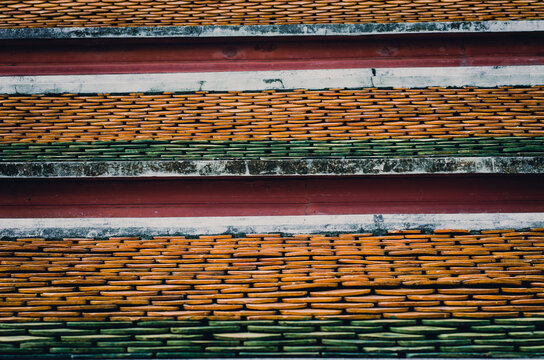 Old ceramic roof top in Thai temple, vintage tone picture