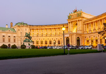 Hofburg palace and statue of Prince Eugene on Heldenplatz square at sunset, Vienna, Austria
