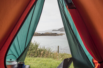 Wild camping in Scotland. View from the tent © FitchyImages 