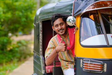 Indian auto rickshaw three-wheeler tuk-tuk taxi driver man - obrazy, fototapety, plakaty