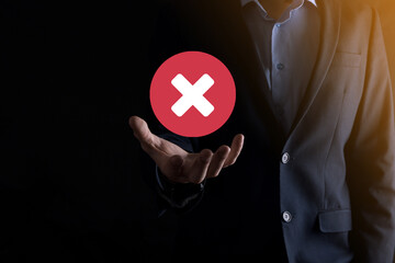 Hand holds icon,cancellation symbol,cancel icon.Cross mark flat red icon.round X mark.cancel...