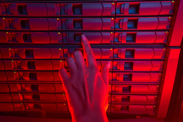 It specialist working with equipment of supercomputer in server room
