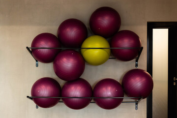 Set of sports equipment a lot of fitness balls in the gym