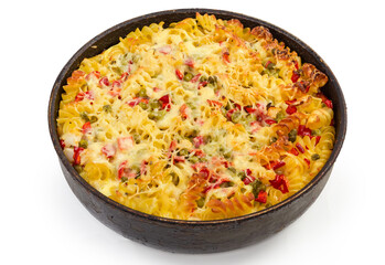 Baked casserole with spiral pasta, vegetables and cheese in pan