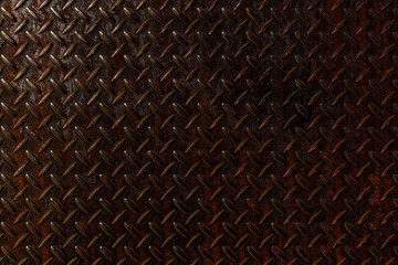 赤黒く光を反射している鋼鉄板