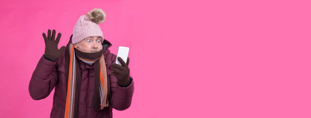 man with surprised or amazed expression looking at the phone