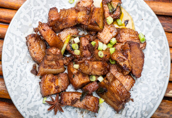 Braised pork belly close-up, top view.