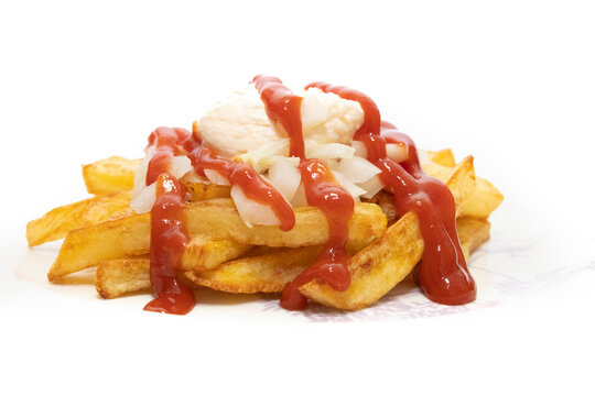 Frites spezial with mayonnaise, ketchup and onions, isolated on a white background.Particularly popular in the Netherlands is friet speciaal ("French fries special").