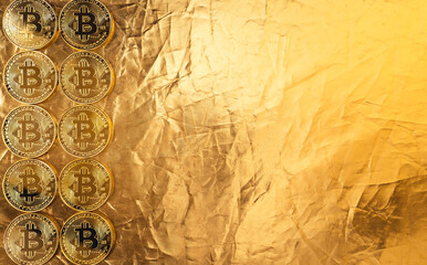 Fototapeta na wymiar gold bitcoin on gold background