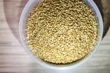Buckwheat in a plastic jar for cooking porridge