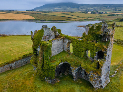 Old derelict Ballycarberry castle with ivy, Ireland.