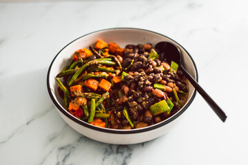 vegan mexcina-inspired bean chilli wit green beans and sweet potato, healthy plant-based food