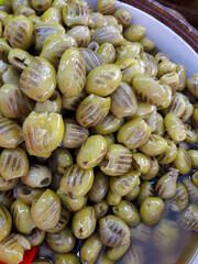 Grilled green olives