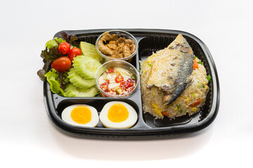 hai food lunch box in plastic packages, Authentic Thai mackerel fried rice.