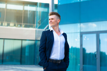 Business. Businessman Standing City Street Near Office Building .