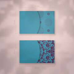 Business card in turquoise color with abstract purple pattern for your brand.