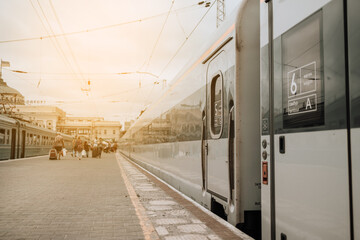 Modern intercity train on railway platform. Traveling concept