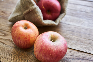 apples on a wooden table vitamins fresh fruits organic