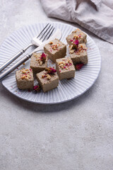 Halva with rose petal and nuts.