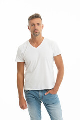 Keep it simple. Serious man isolated on white. Handsome man in white tshirt. Caucasian guy