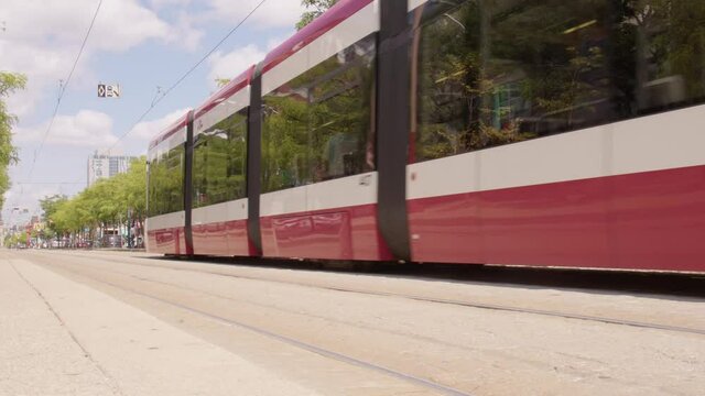Low Shot of Toronto Tram Going Away, Spadina Ave.