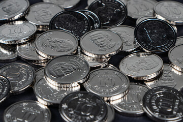 Ukrainian hryvnias coins. Background from Ukrainian coins 10 hryvnia. Money and finances.