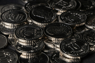 Ukrainian hryvnias coins. Background from Ukrainian coins 10 hryvnia. Money and finances.