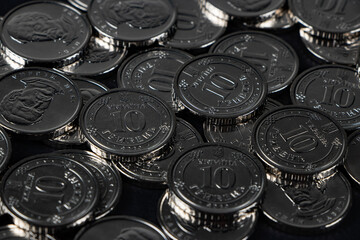 Ukrainian hryvnias coins. Background from Ukrainian coins 10 hryvnia. Money and finances.