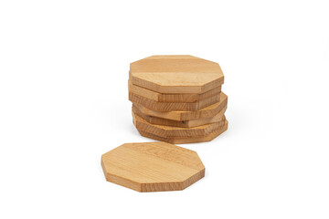 Octagon wooden coasters isolated above white background