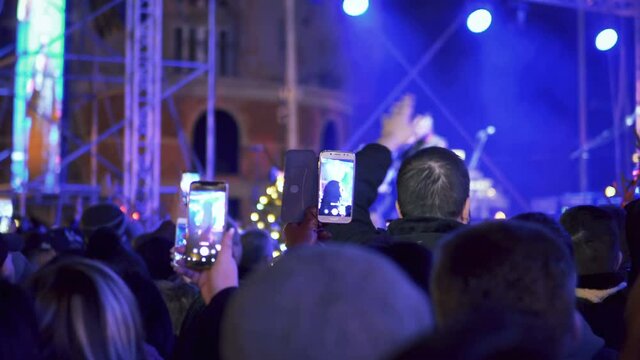 Bansko, Bulgaria - 09 Sep, 2019: People recording videos and shooting photos at concert in Bansko, Bulgaria