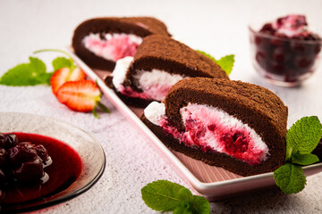 Cherry cottage cheese cake with mint leaves