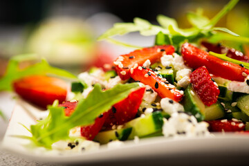 salad with arugula and strawberry