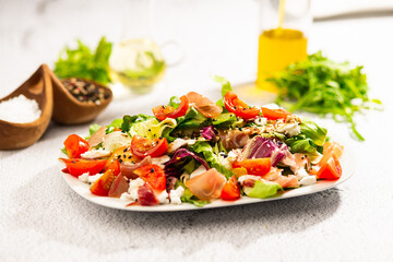salad with tomato parma ham and cheese