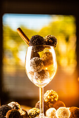 coconut cocoa and walnut balls in a wine glass