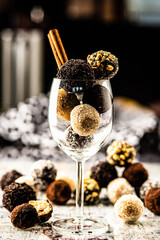 coconut cocoa and walnut balls in a wine glass