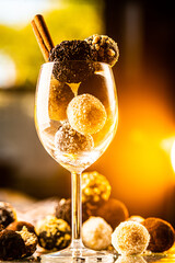 coconut cocoa and walnut balls in a wine glass