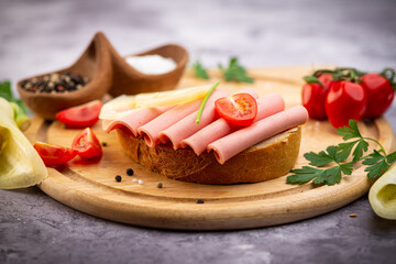sandwich in traditional style on wooden plate