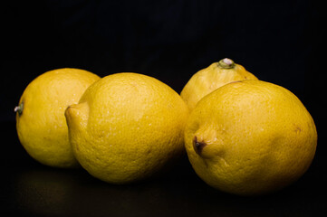 lemons on black background