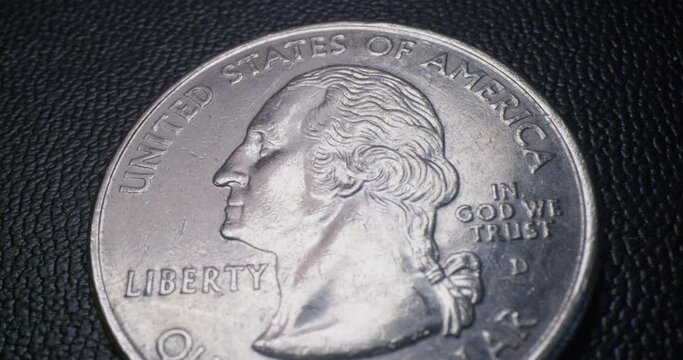 Close Up Pan of a United States Quarter Dollar Coin