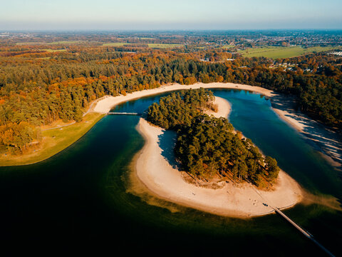 Aerial drone view of the white sandy lake the Henschotermeer in the Netherlands, Europe. 