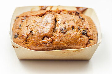 Freshly made spiced fruit  loaf cake  on the white  background