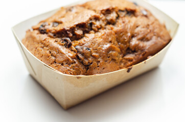 Freshly made spiced fruit  loaf cake  on the white  background