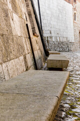 Fototapeta na wymiar stone wall and benches