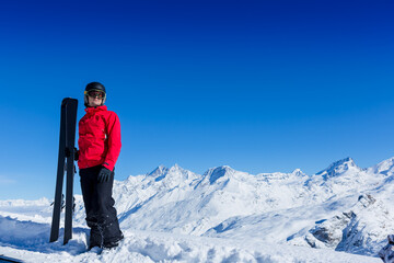 Fototapeta na wymiar Skier, skiing, winter sport - portrait of male skier