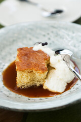 Homemade vanilla cake with chipped cream and caramel