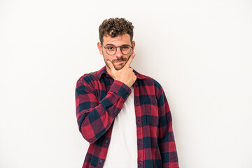 Young caucasian man isolated on white background contemplating, planning a strategy, thinking about the way of a business.