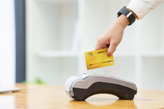 Staff using edc credit card reader