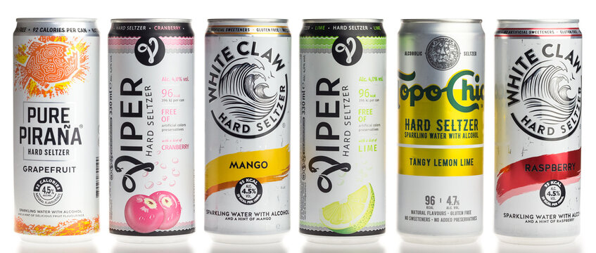 Cans of Hard Seltzer drinks in different flavours and brands isolated on white