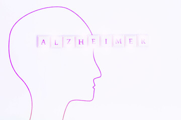 Dementia Alzheimer with text and elderly man.World Alzheimer's day banner Alzheimer word background.Purple.Autism, memory loss, dementia, epilepsy and alzheimer awareness, world mental health day.