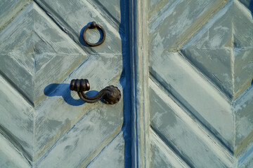vintage wooden church door in sunlight